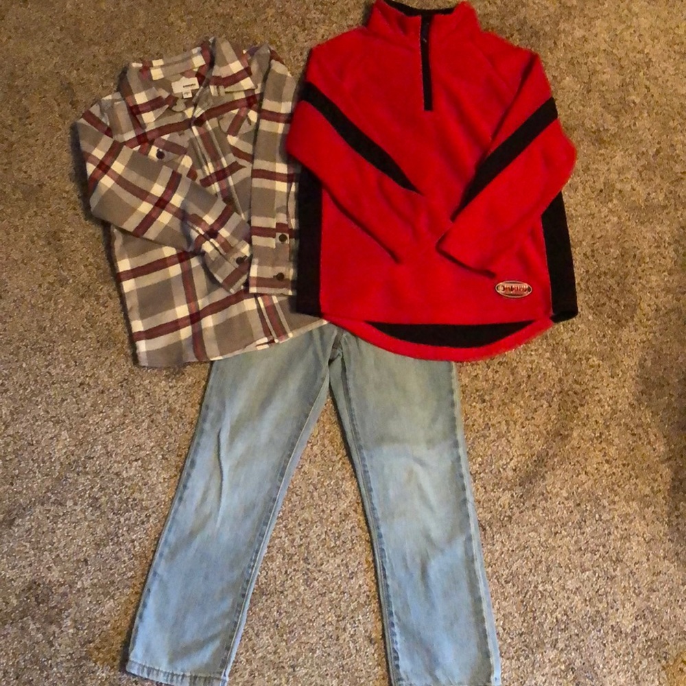 Jeans, fleece pullover and flannel shirt